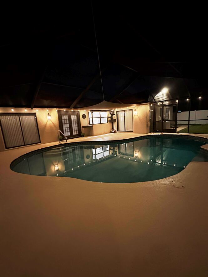 COMPLETELY RENOVATED FOUR BEDROOM TWO BATH POOL HOME