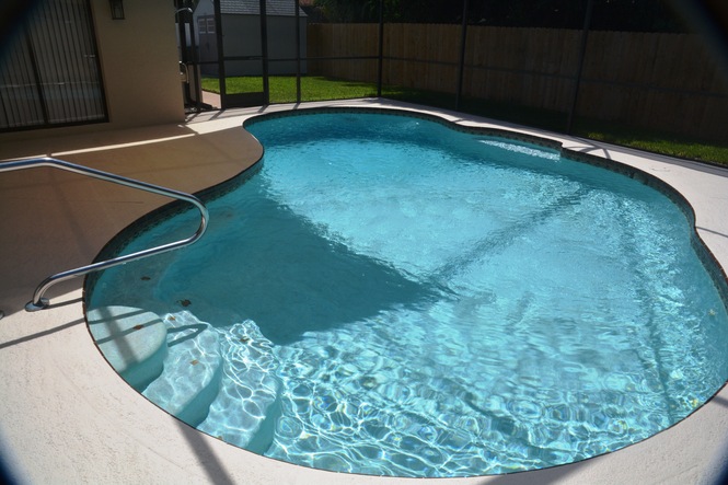 COMPLETELY RENOVATED FOUR BEDROOM TWO BATH POOL HOME