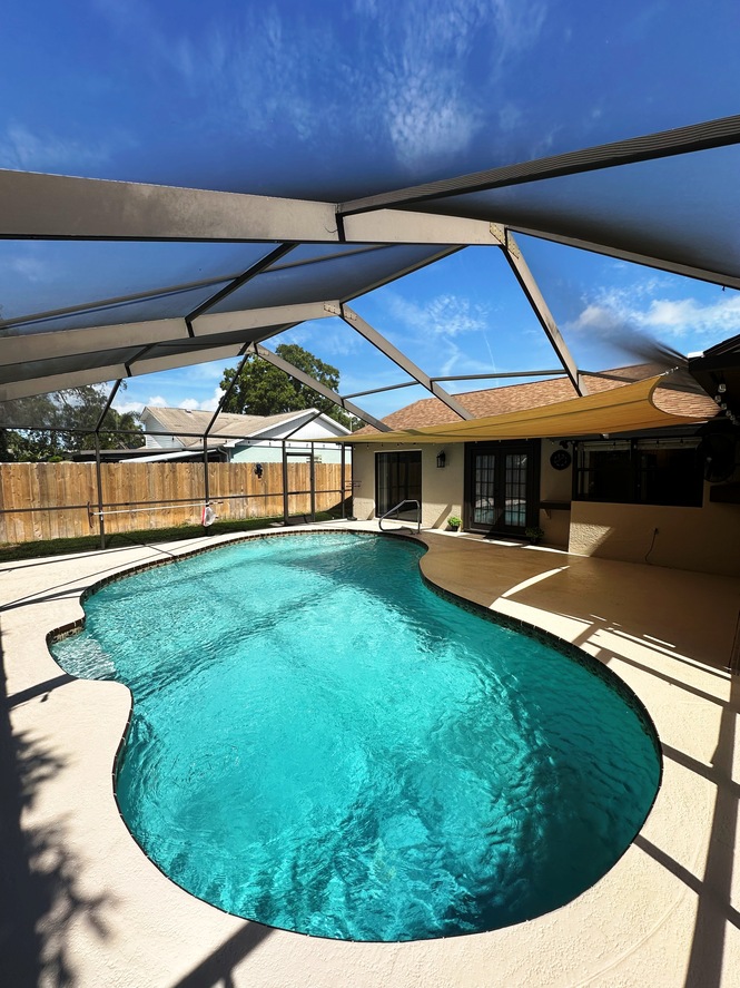 COMPLETELY RENOVATED FOUR BEDROOM TWO BATH POOL HOME