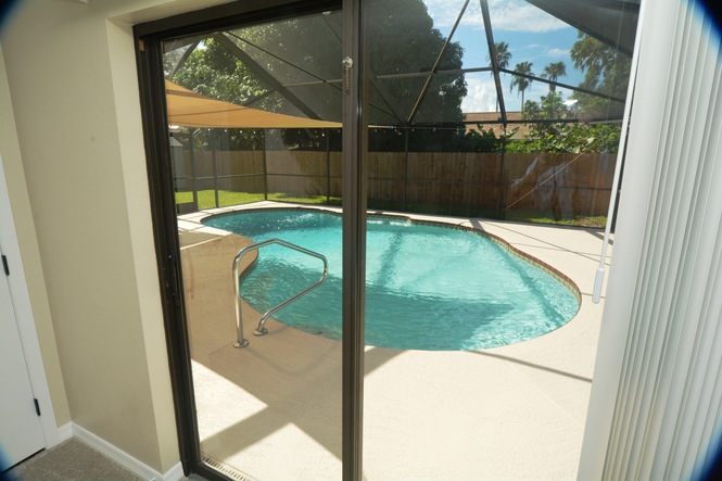 COMPLETELY RENOVATED FOUR BEDROOM TWO BATH POOL HOME