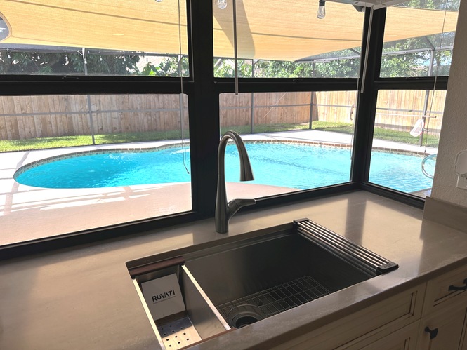 COMPLETELY RENOVATED FOUR BEDROOM TWO BATH POOL HOME