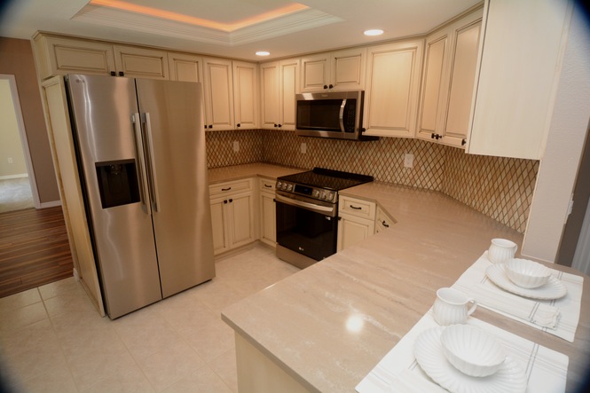 COMPLETELY RENOVATED FOUR BEDROOM TWO BATH POOL HOME