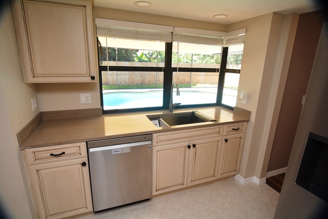 COMPLETELY RENOVATED FOUR BEDROOM TWO BATH POOL HOME