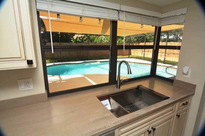 COMPLETELY RENOVATED FOUR BEDROOM TWO BATH POOL HOME