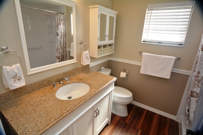 COMPLETELY RENOVATED FOUR BEDROOM TWO BATH POOL HOME